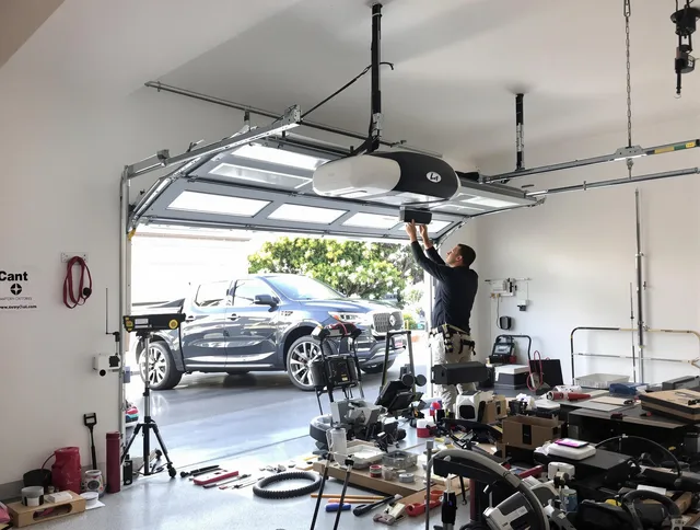Carson Garage Door Repair specialist installing smart garage door opener system in Carson home